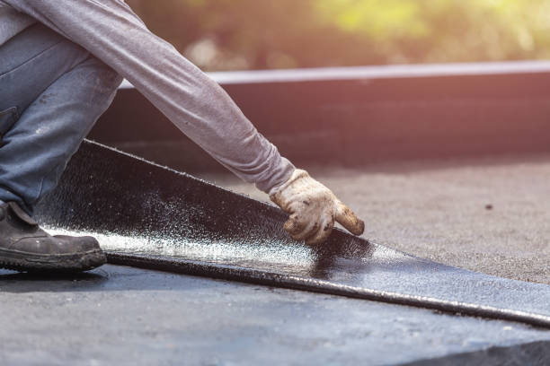 Professional Exterior Waterproofing technician working in Walhalla, MI